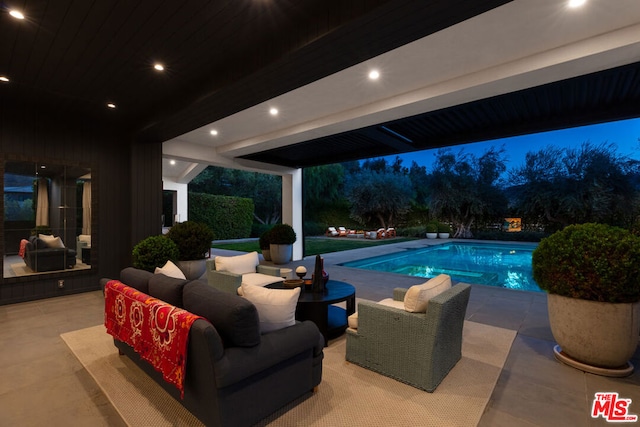 view of pool featuring a patio and outdoor lounge area