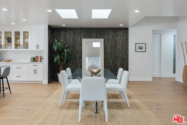 dining room with light hardwood / wood-style flooring