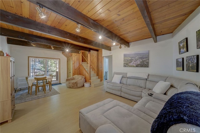 living room with wood ceiling, track lighting, beam ceiling, and light hardwood / wood-style floors