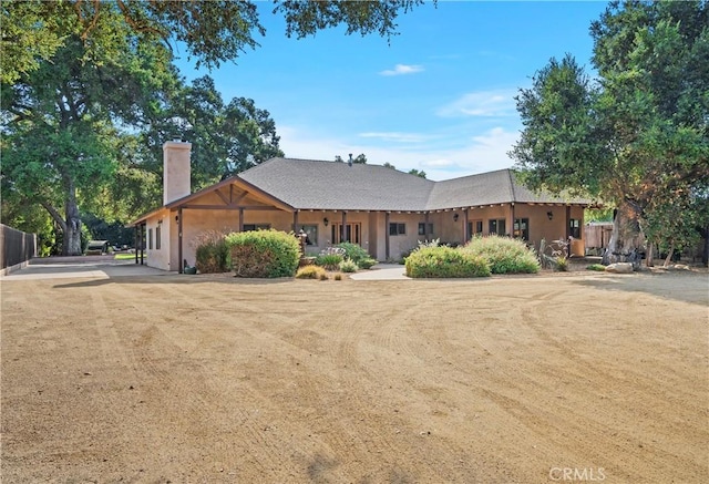 view of front of home with a front lawn