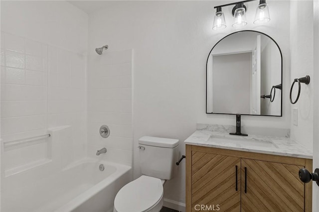 full bathroom featuring vanity, bathtub / shower combination, and toilet