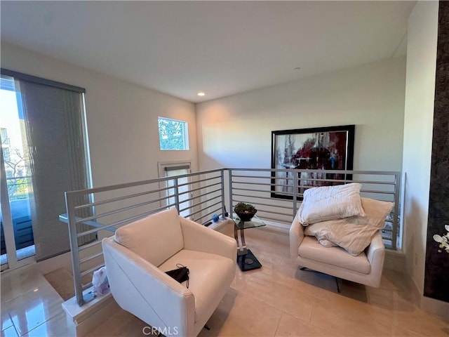 sitting room with light tile patterned floors