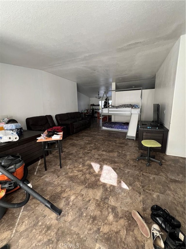 living room featuring a textured ceiling