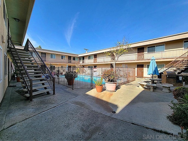 view of patio / terrace with a community pool