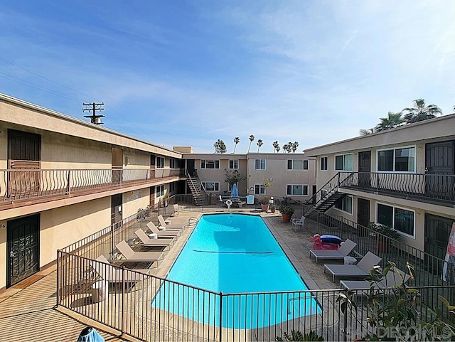 view of swimming pool featuring a patio