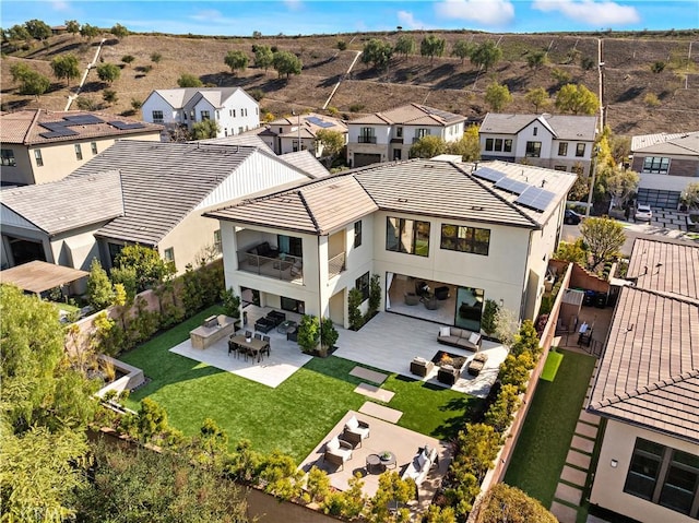 birds eye view of property with a residential view