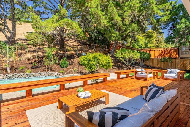 wooden deck featuring an outdoor hangout area