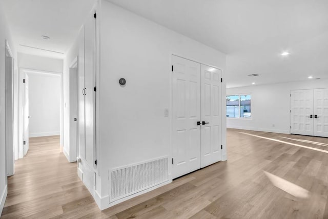 hall featuring light hardwood / wood-style floors