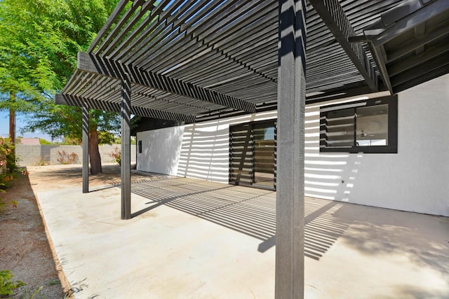 view of patio featuring a pergola