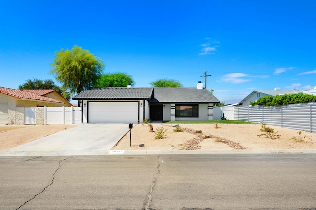 view of front of home with a garage