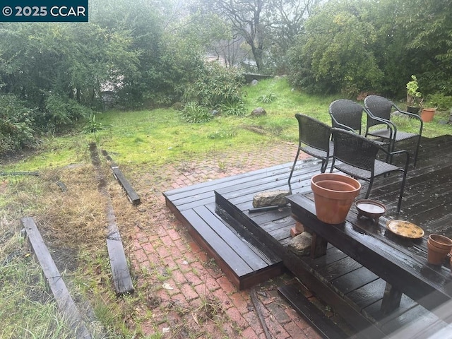 wooden deck featuring a patio