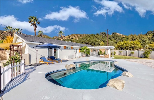 view of pool featuring a patio and a pergola