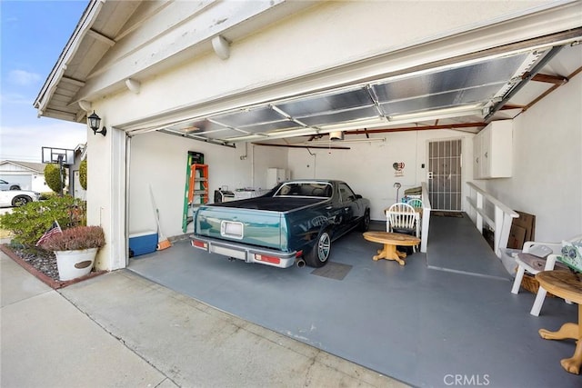 garage featuring a garage door opener