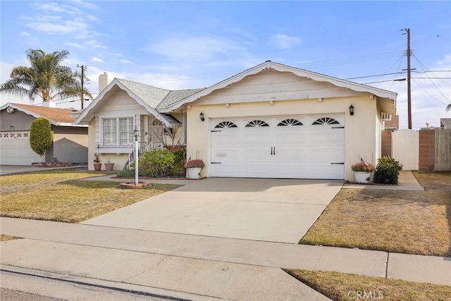 ranch-style house with a garage and a front yard