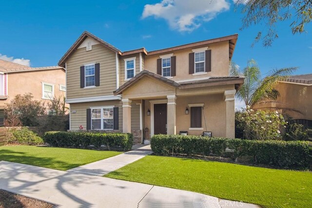 view of front of home featuring a front yard