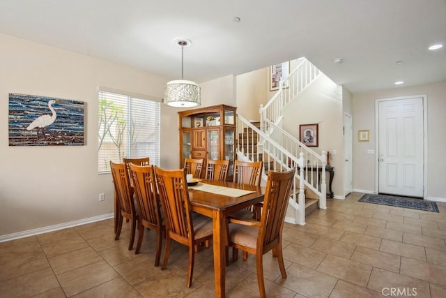 dining area featuring tile patterned floors