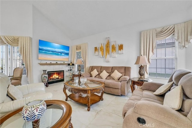 living room featuring vaulted ceiling