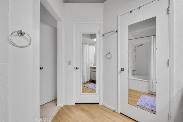 hallway featuring light wood-type flooring