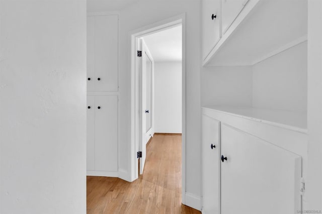 hall featuring light hardwood / wood-style floors