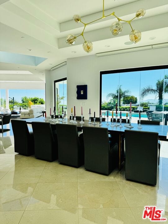 kitchen with a raised ceiling