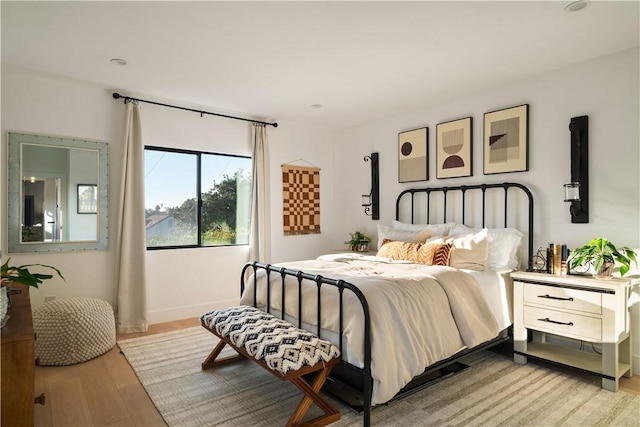 bedroom featuring light hardwood / wood-style floors