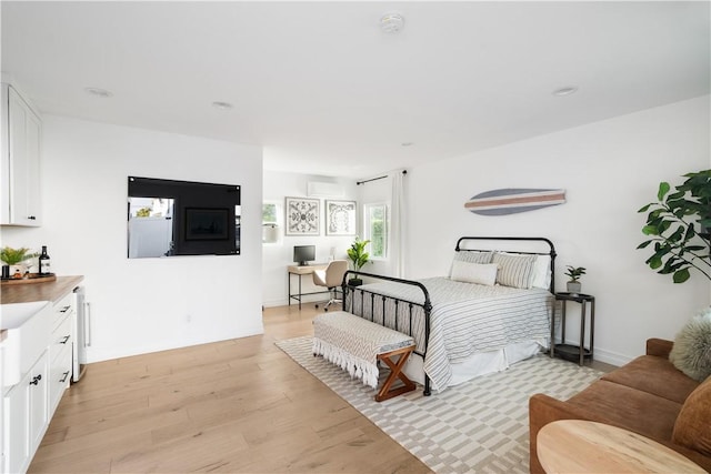 bedroom featuring light hardwood / wood-style flooring