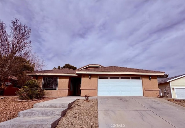 view of front of property featuring a garage