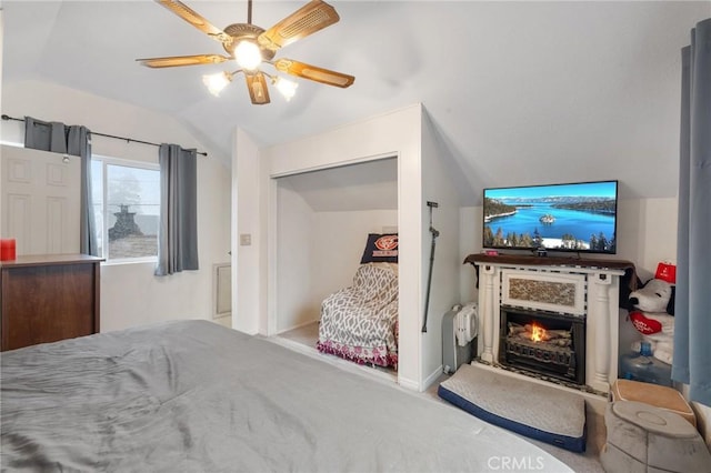 bedroom with vaulted ceiling and ceiling fan