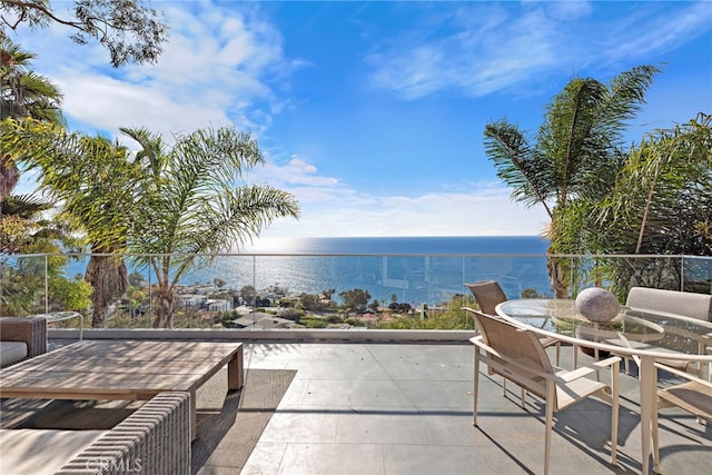 view of patio / terrace with a water view