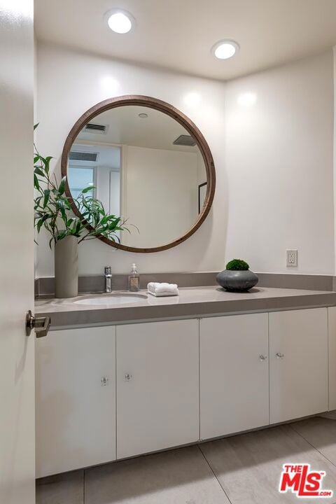 bathroom featuring vanity and tile patterned floors