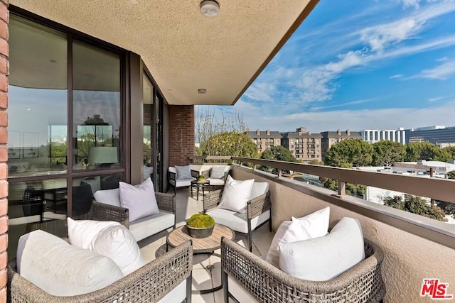 balcony featuring an outdoor hangout area