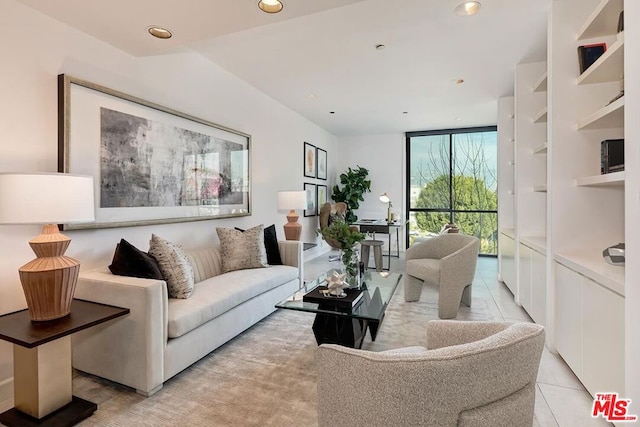 tiled living room with expansive windows