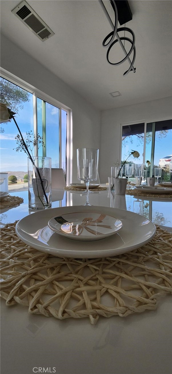 unfurnished dining area with a water view