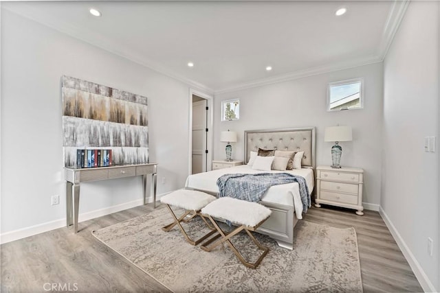 bedroom featuring crown molding and wood-type flooring