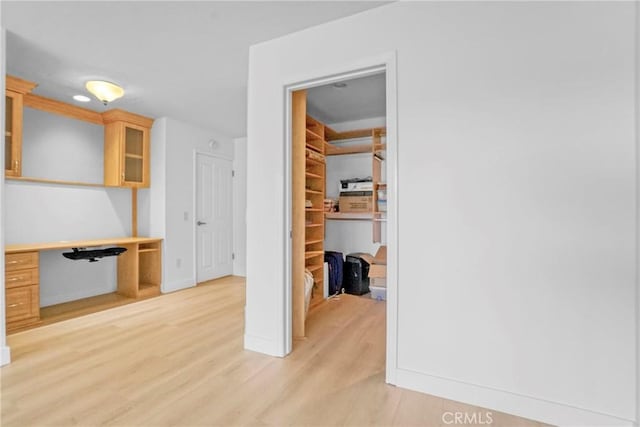 hall featuring light hardwood / wood-style flooring