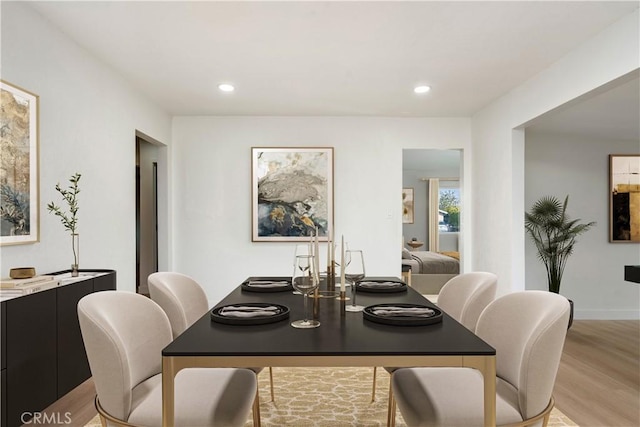 dining room featuring light hardwood / wood-style flooring