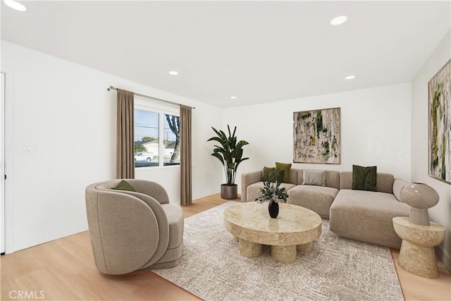 living room with light hardwood / wood-style flooring