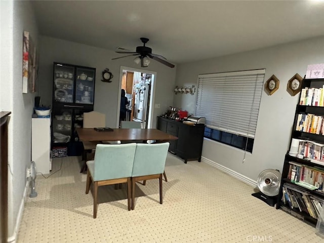 dining area featuring ceiling fan