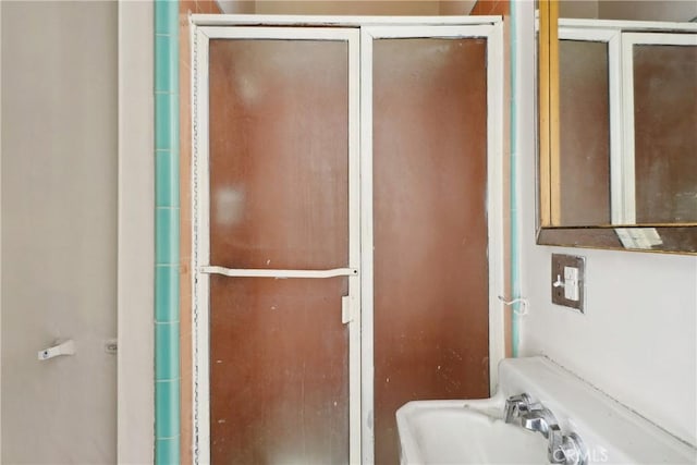 bathroom featuring sink and walk in shower