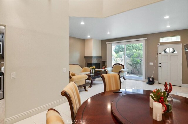 dining space with light tile patterned floors