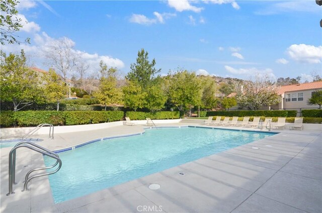 view of pool with a patio area