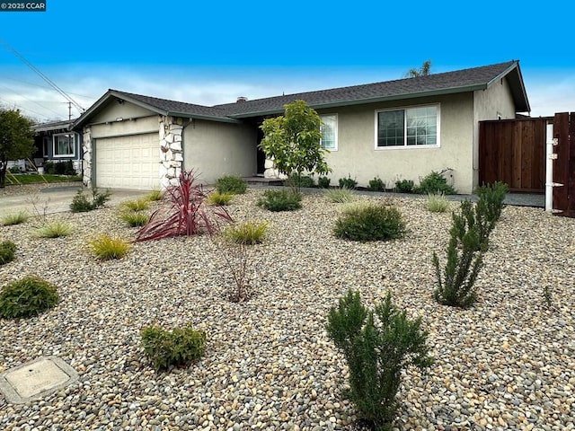 ranch-style home with a garage