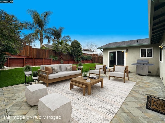 view of patio / terrace featuring an outdoor living space and a grill