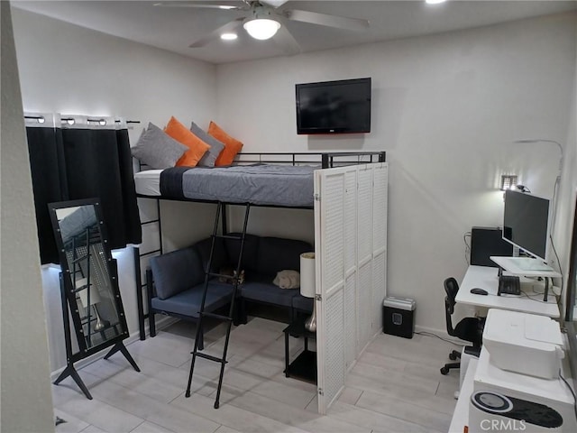 bedroom featuring ceiling fan