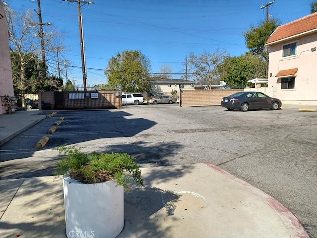 view of street featuring a gate