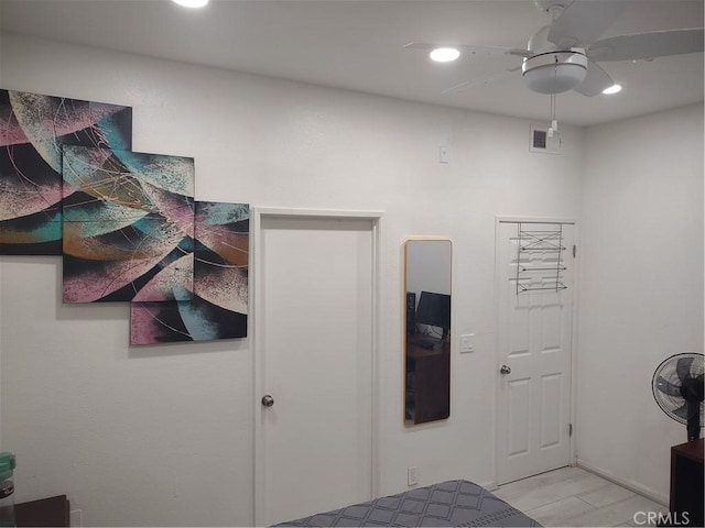 bedroom featuring a ceiling fan, recessed lighting, and visible vents