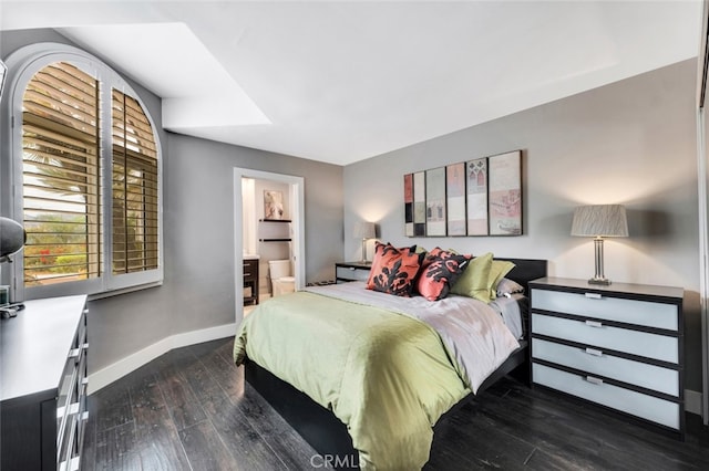 22544 N Summit Ridge Cir, Chatsworth, CA 91311 - bedroom featuring dark wood-style flooring and ensuite bath