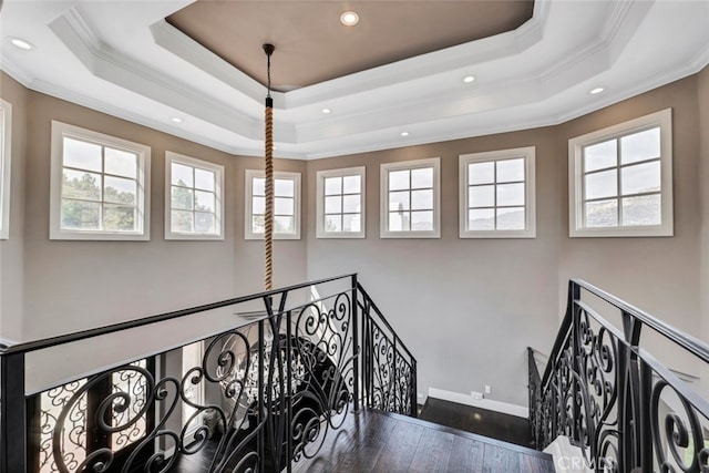 22544 N Summit Ridge Cir, Chatsworth, CA 91311 - stairs with a raised ceiling, ornamental molding, recessed lighting, and wood finished floors