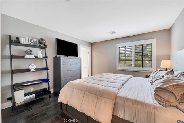 22544 N Summit Ridge Cir, Chatsworth, CA 91311 - bedroom with dark wood-style flooring and baseboards