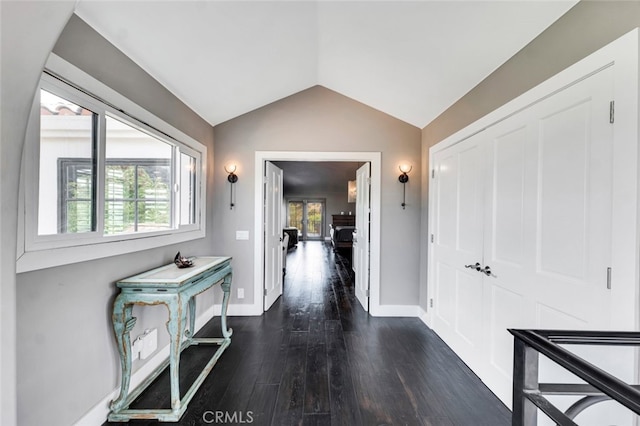 22544 N Summit Ridge Cir, Chatsworth, CA 91311 - hall with lofted ceiling and dark wood-type flooring